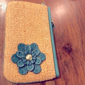 Authentic Coach straw wristlet with flower